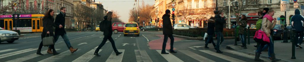 People walking on crosswalk in city